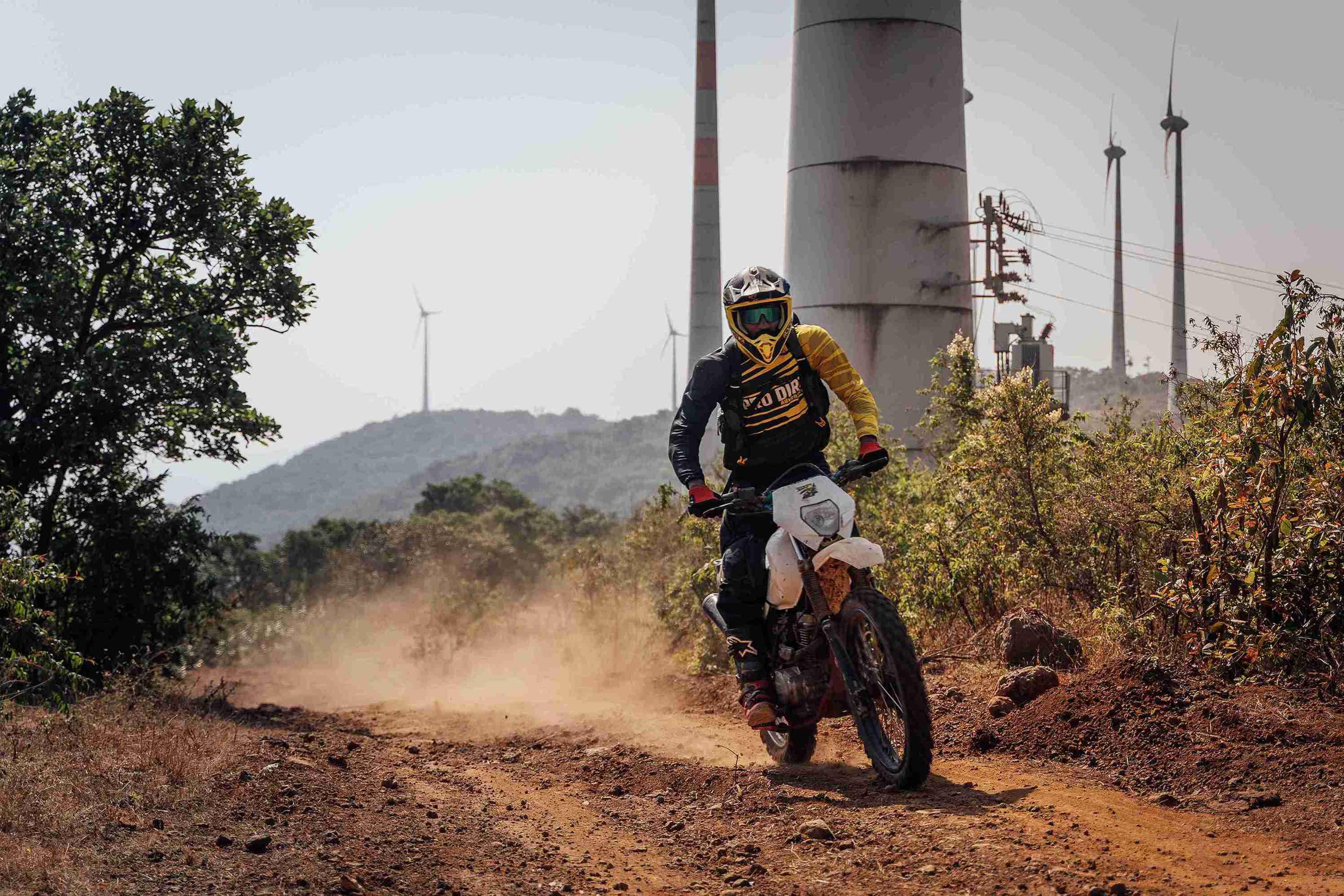 Rider sliding the rear wheel on the dirt oval