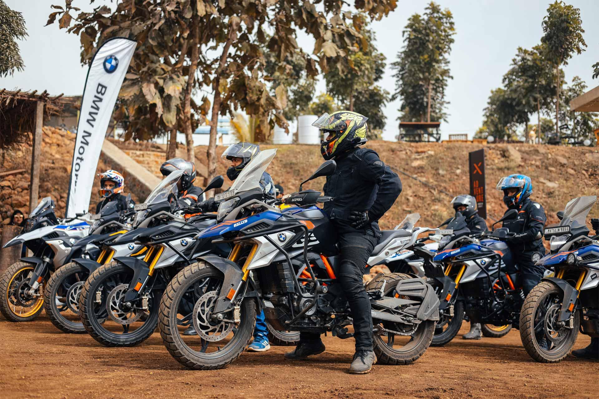 A row of BMW GS bikes lined up before a clinic